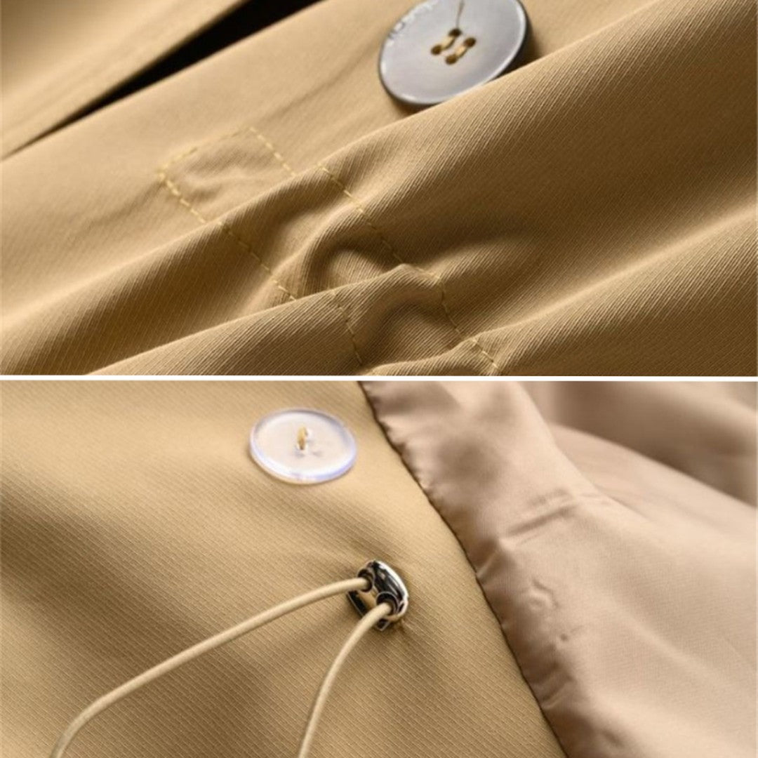 Close-up of the trench coat button and lapel detail