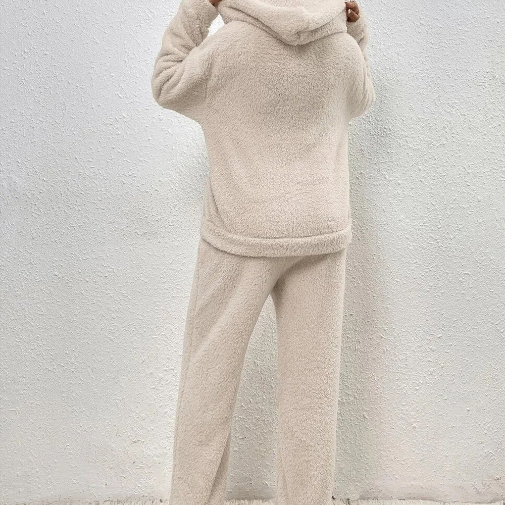 Two-piece hooded teddy fleece set, styled sitting down