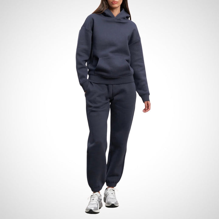 Two-piece hoodie and jogger set in blue, worn on a model