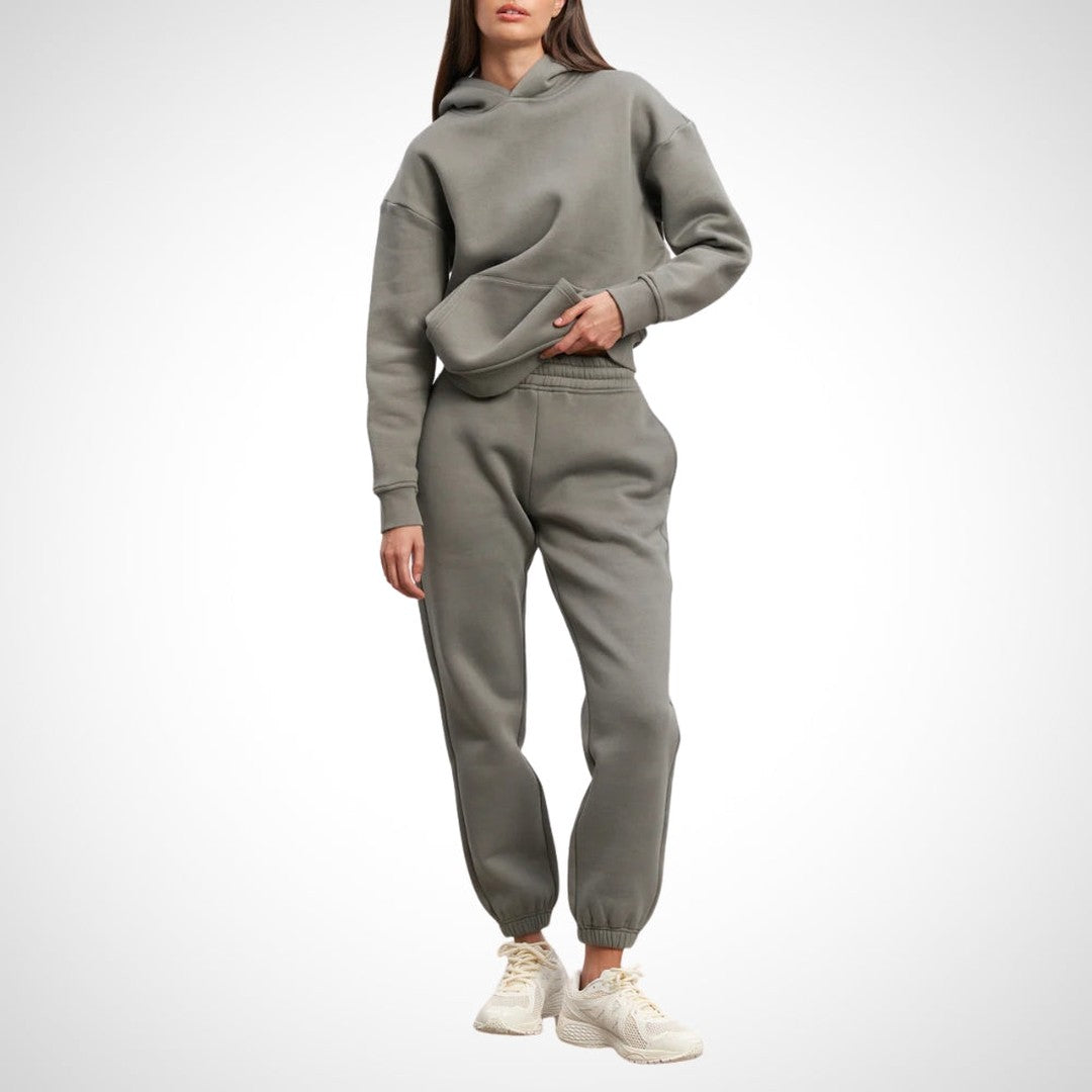 Two-piece hoodie and jogger set in olive, worn on a model